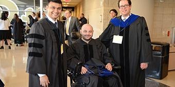 SHRS PhD graduates in graduation robes