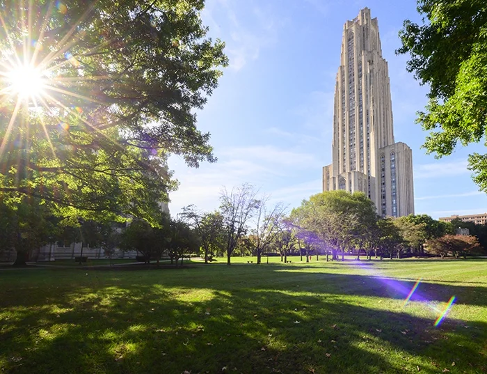 Cathedral of Learning and campus lawn on a sunny day